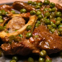 Ossibuchi con piselli